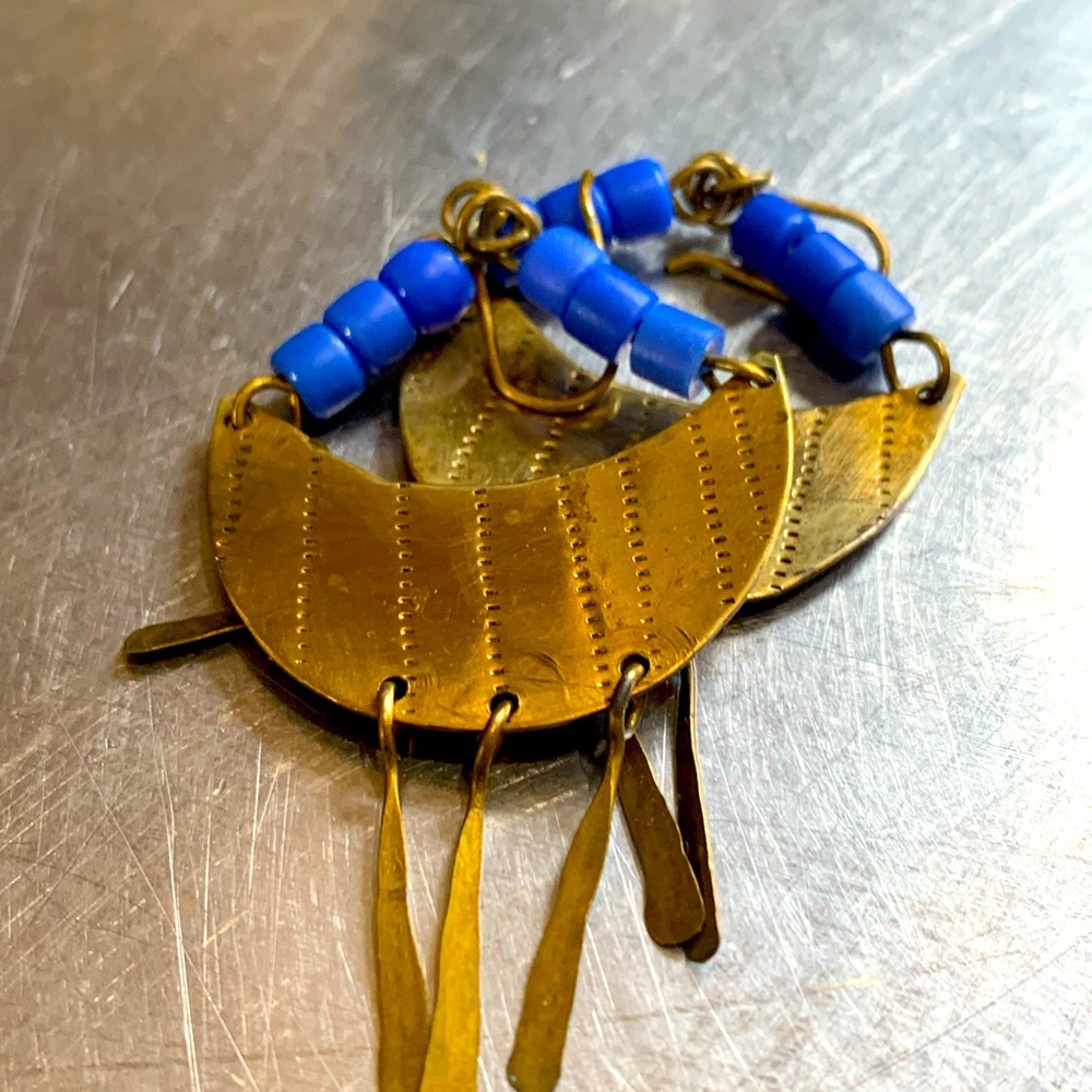 Hand-crafted vintage stamped brass and blue glass bead earrings.